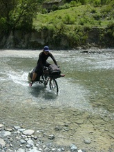 Kybi trying to bath with his bike
