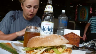 Dasa eating torta in La Magdalena