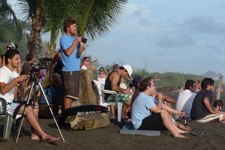 Watching a surfing competition, Playa Hermosa, Costa Rica
