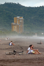 Young couple on the Jaco beach, Costa Rica